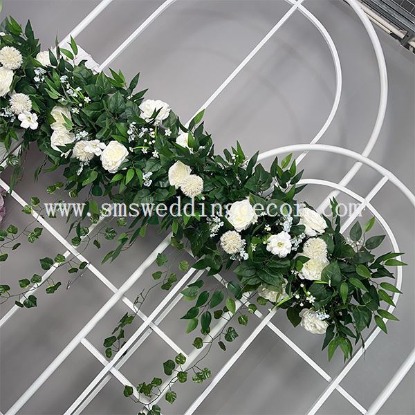 white wedding flowers with greenery